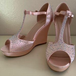 Blush pink, jeweled wedge sandals.